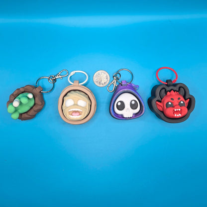 Collection of colorful keychains on a blue surface